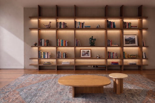 Proyecto San Isidro: restauración de biblioteca cedro + mesas CALA y VELO — diseño integral minimalista